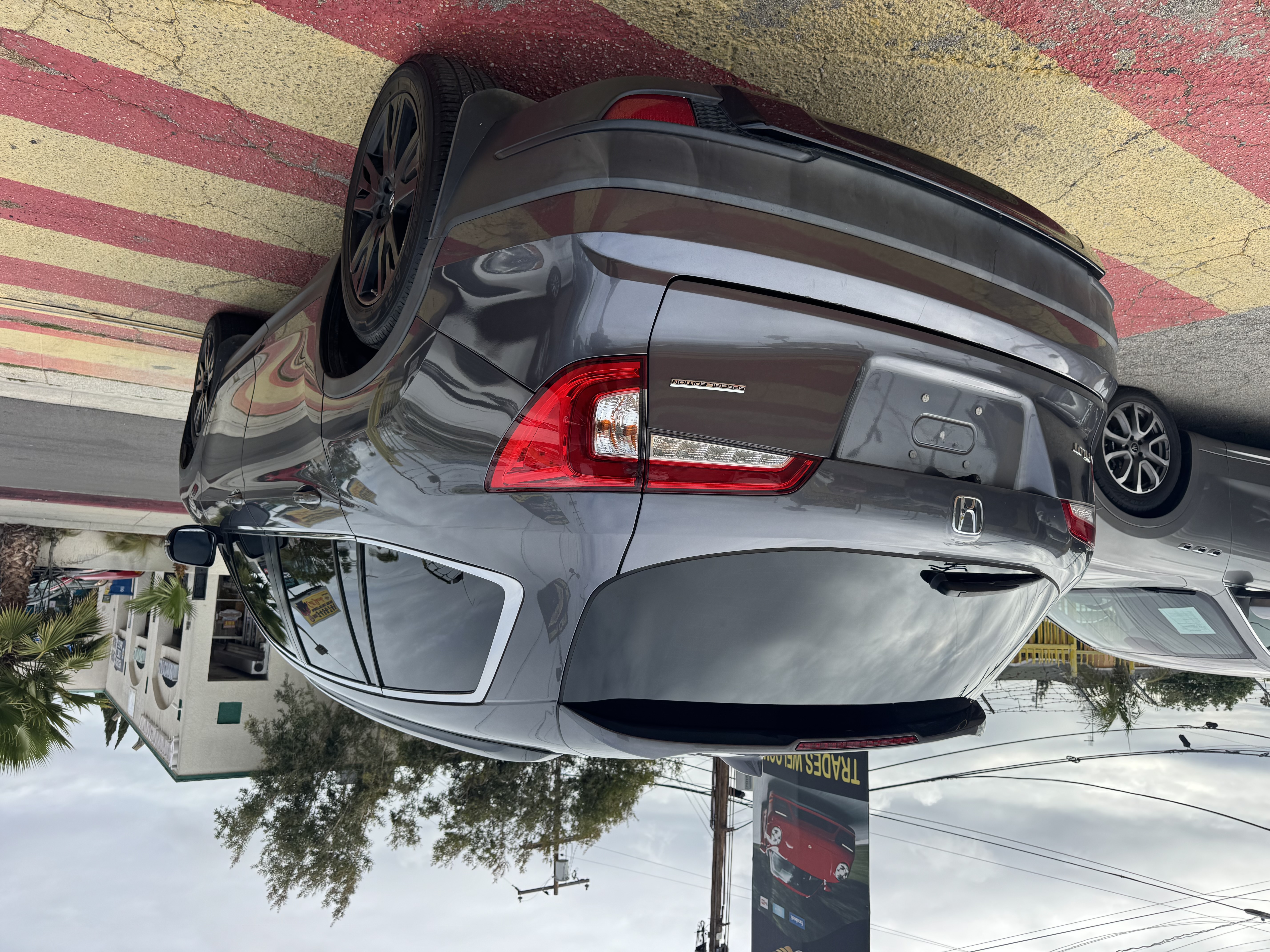 View vehicle photo 3