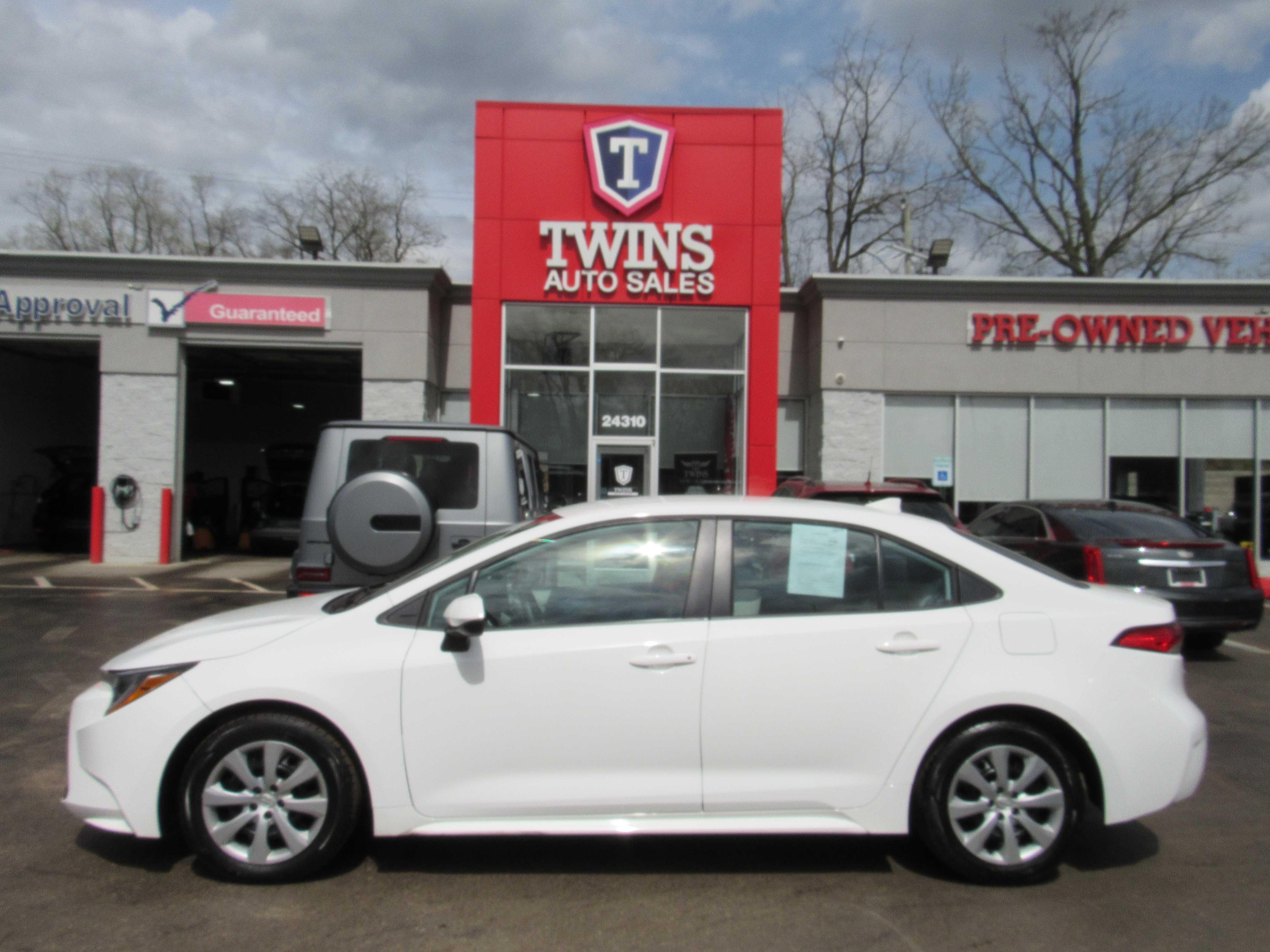 White 2023 Toyota Corolla LE FWD Sedan Front-Wheel Drive Continuously Variable Transmission