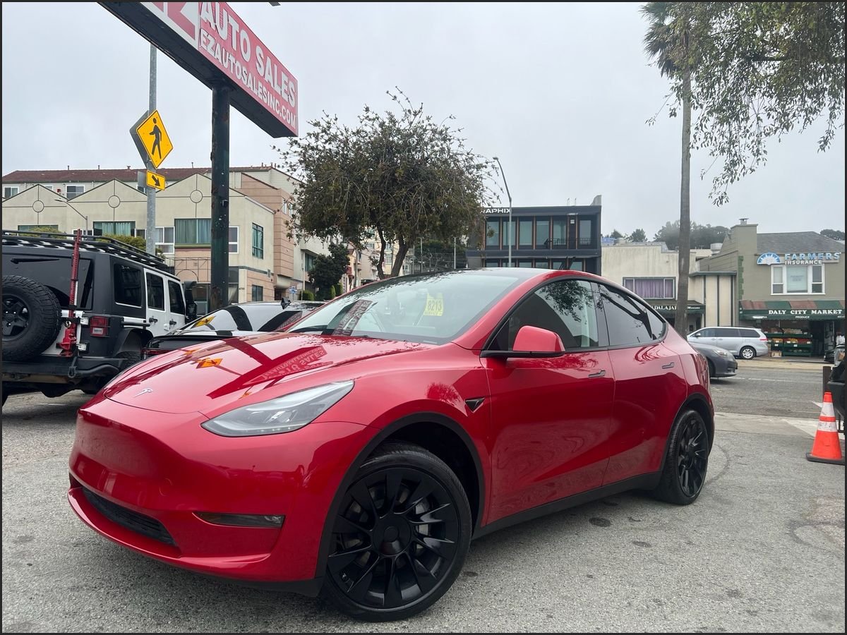 Red 2023 Tesla Model Y SUV / Crossover Rear-Wheel Drive Automatic