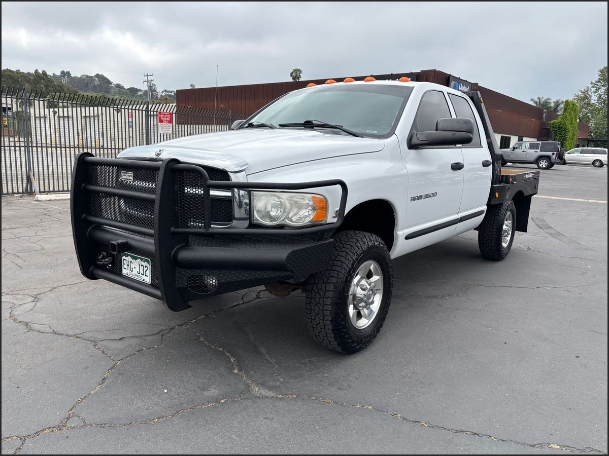 White 2005 Dodge RAM 3500 SLT Quad Cab 4WD Pickup Truck Four-Wheel Drive 6-Speed Manual